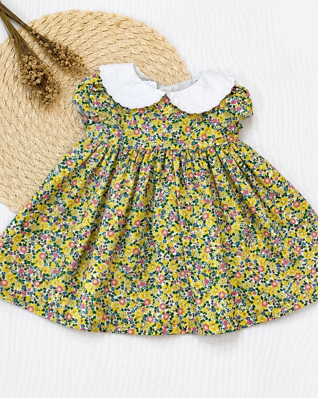 Vestido Bebê Floral Amarelo Gola Peter Pan