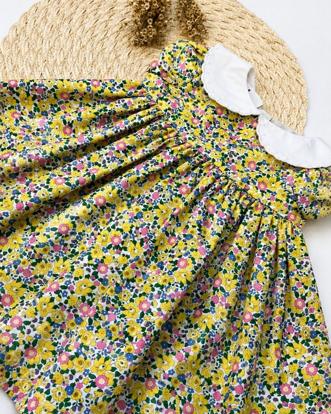 Vestido Bebê Floral Amarelo Gola Peter Pan