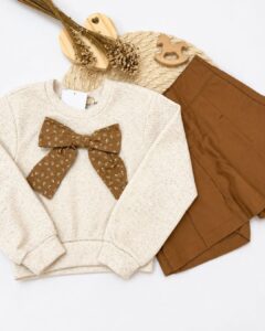 Conjunto Infantil Com Laço E Shorts Saia